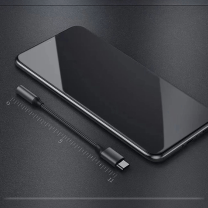 USB-C kuulokeadapteri noin 11 cm – viivottimen vieressä